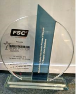 Award: Manufacturing Supply Chain Service Provider of the Year (tall glass trophy)